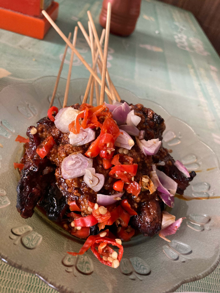 A plate of nostalgia: Rumah Makan Sate Banyumas Simpang Dago is a sentimental place for university students and workers settling around Simpang Dago (JP/Anindito Ariwandono)