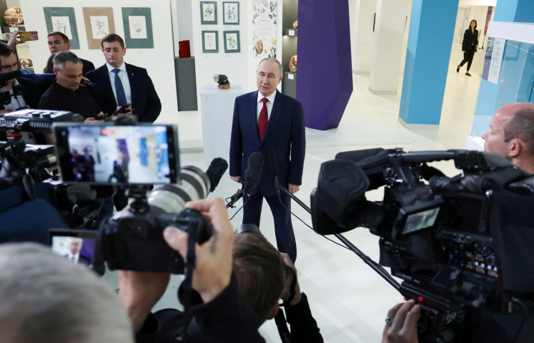 Russian President Vladimir Putin meets with journalists following a phone call with US President Donald Trump at the Sirius educational center for gifted children near Sochi in the Krasnodar region, Russia on May 19, 2025. 