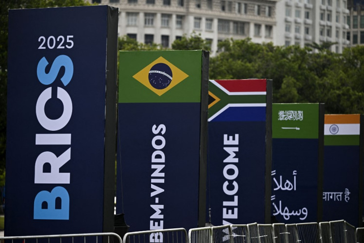 BRICS summit banners are seen on Thursday near the Modern Art Museum (MAM) where the BRICS summit 2025 is being held in Rio de Janeiro, Brazil.